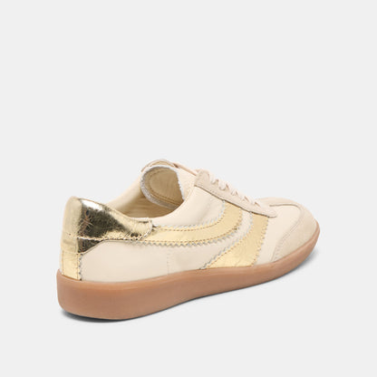 Merit White Gold Leather Sneakers | Dolce Vita Essential