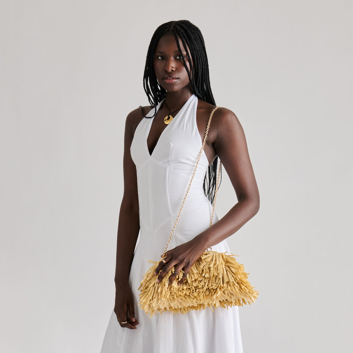 Serina Natural Raffia Clutch | Dolce Vita Premium