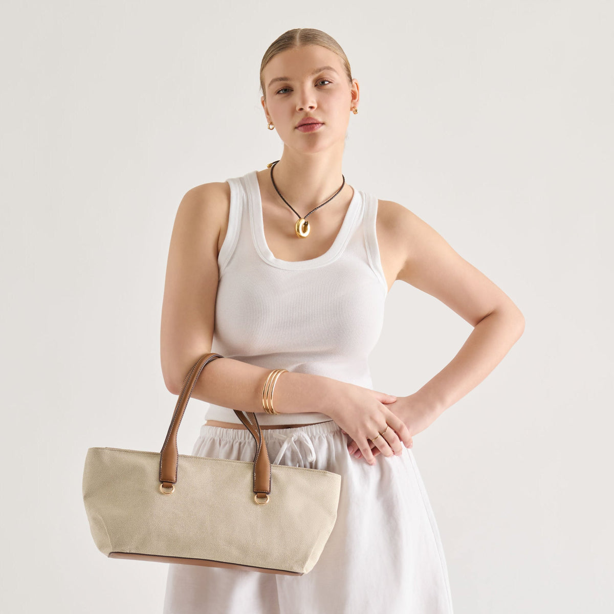 CLARINA Natural Canvas Shoulder Bag | Dolce Vita Best Seller
