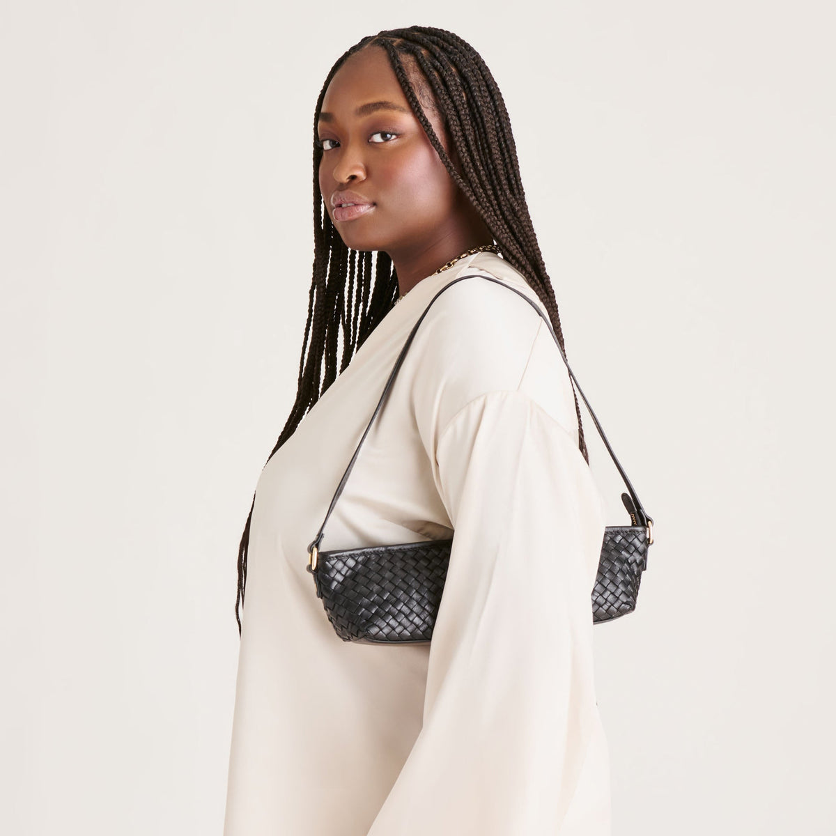Savaii Black Woven Leather Shoulder Bag | Dolce Vita Premium